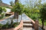 Garden with pond seen from porch area